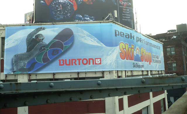 MusiGraphics billboard design for Burton, featuring a snowboarder and winter sports message